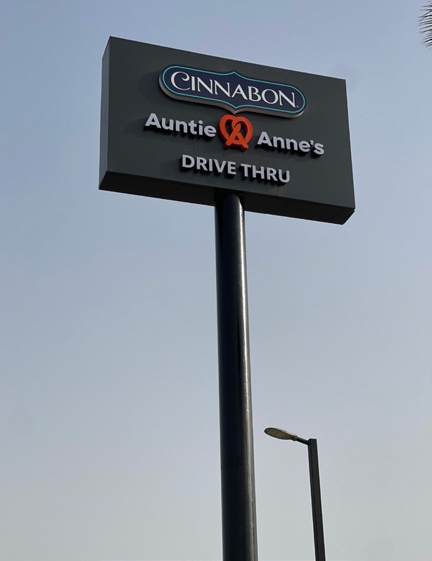 Freestanding Cinnabon and Auntie Anne’s sign shown in the company profile
