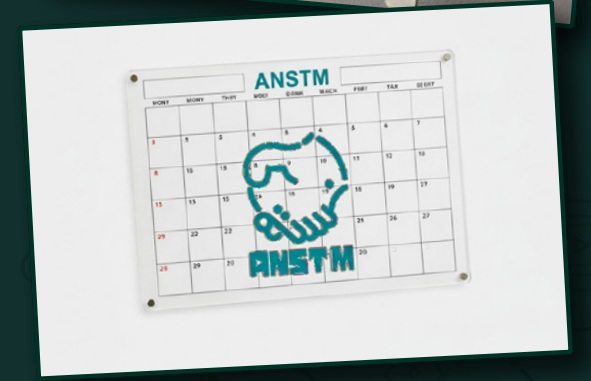 Branded desk calendar with a printed monthly grid in the original profile