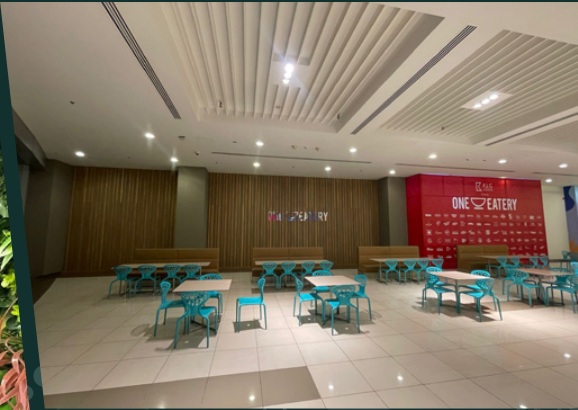 Finished dining interior with ceiling lights, wall finishes and seating in the original profile