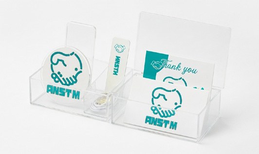 Branded acrylic display items shown in the Basma Paradise company profile